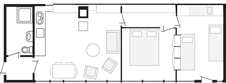 De plattegrond van 'de hut', met links de entree. Daarboven de badkamer. Daarnaast de keuken, woonkamer, gang en twee slaapkamers